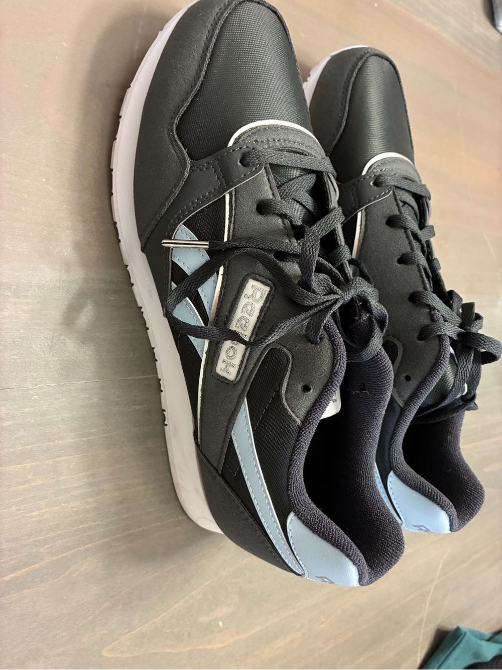 Reebok Women's Black Sneakers with Light Blue Accents